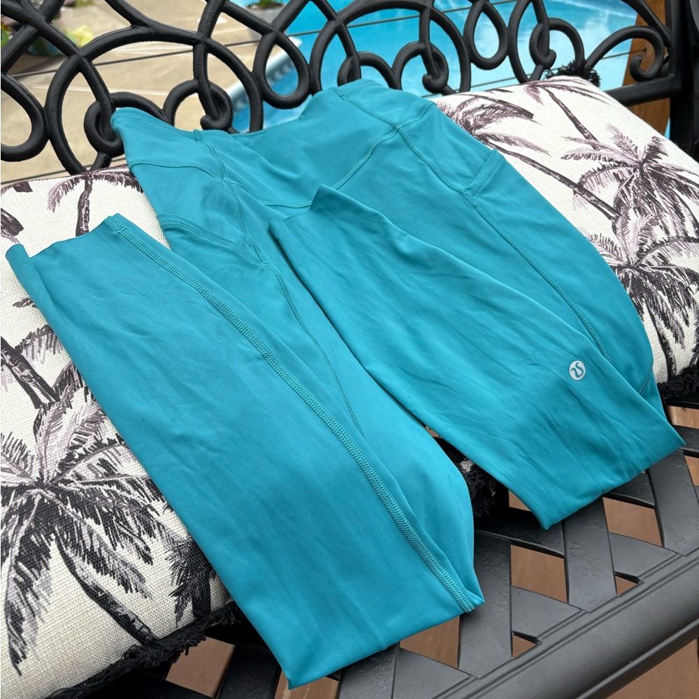 NWOT Lululemon fast & free tight ll.
25” inseam cut hem, w/ pockets. Cyprus.